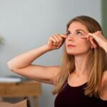 side-view-woman-practicing-facial-yoga_23-2150649531
