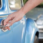 Opening car door, Man hand opening car door, close up