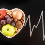 healthy-food-heart-shape-container-with-chalk-drawn-heart-pulse-blackboard_23-2147882212