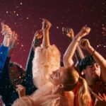 medium-shot-young-people-having-fun-party_23-2151108199