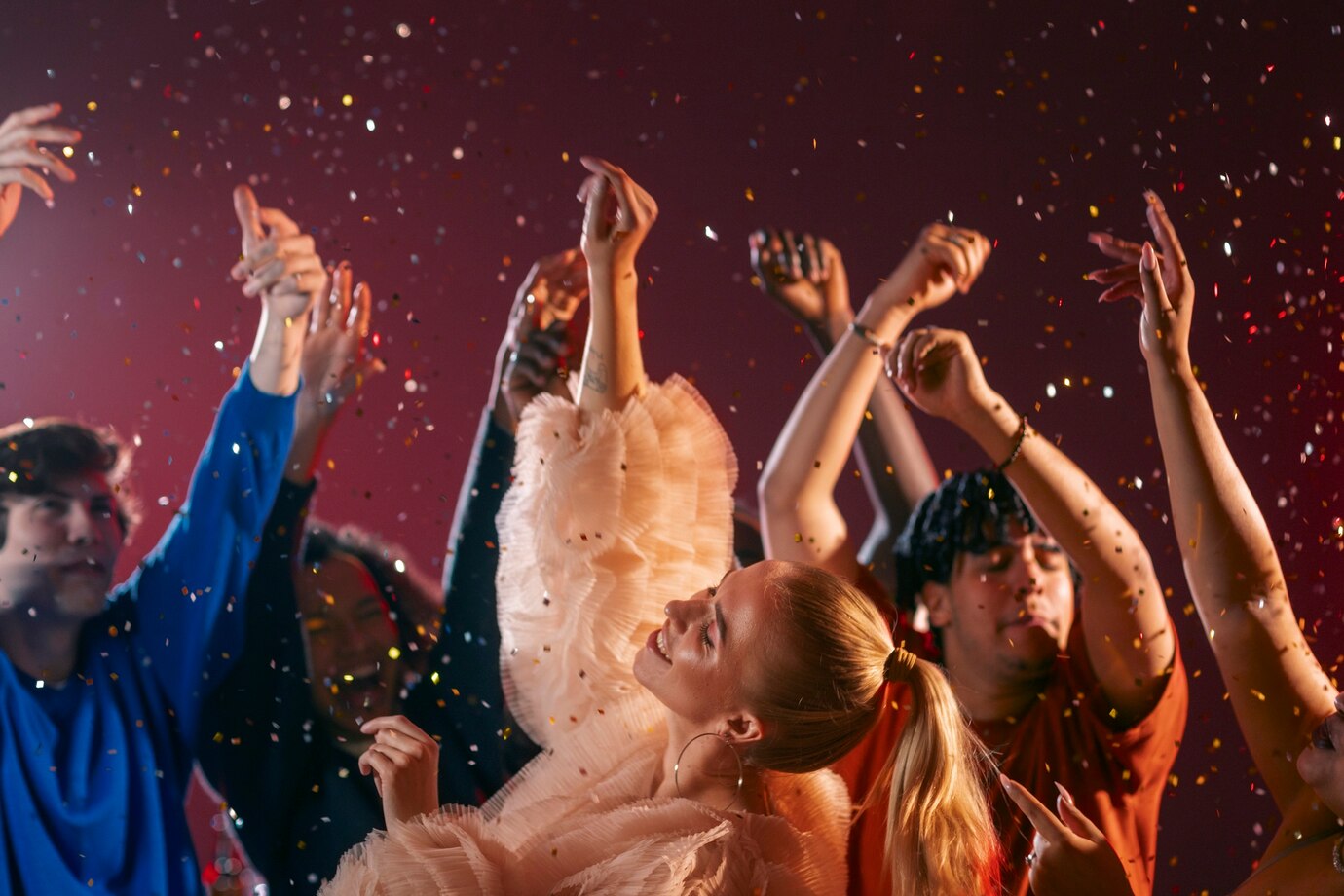 medium-shot-young-people-having-fun-party_23-2151108199
