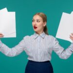 business-lady-pretty-young-girl-office-outfit-looking-paper-sheets_140725-161836