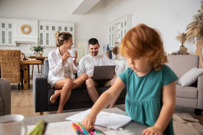 medium-shot-happy-family-home_23-2149102968