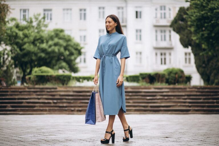 woman-with-shopping-bags_1303-9653