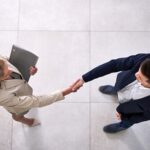 Above,,Business,People,And,Handshake,With,Welcome,For,Meeting,,Greeting