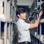 store-worker-taking-detail-from-warehouse_114579-2801
