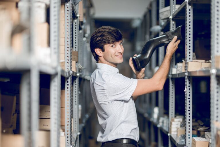 store-worker-taking-detail-from-warehouse_114579-2801