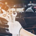 mechanic-man-repairing-car_1150-6496
