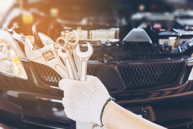 mechanic-man-repairing-car_1150-6496