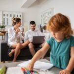 medium-shot-happy-family-home_23-2149102968