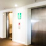 metal-doors-blurry-lifts_1203-1124