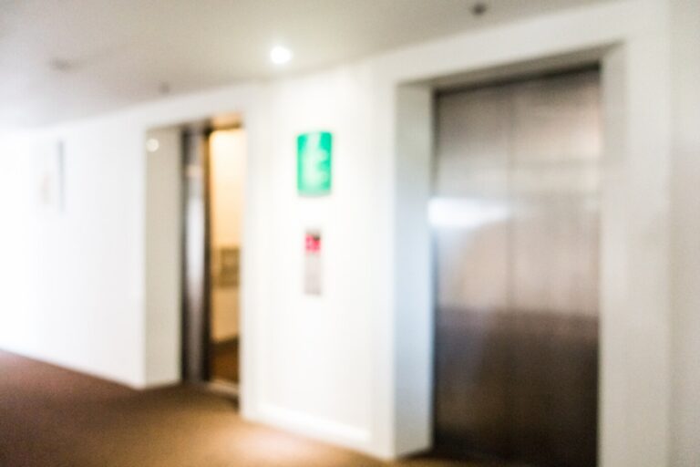 metal-doors-blurry-lifts_1203-1124