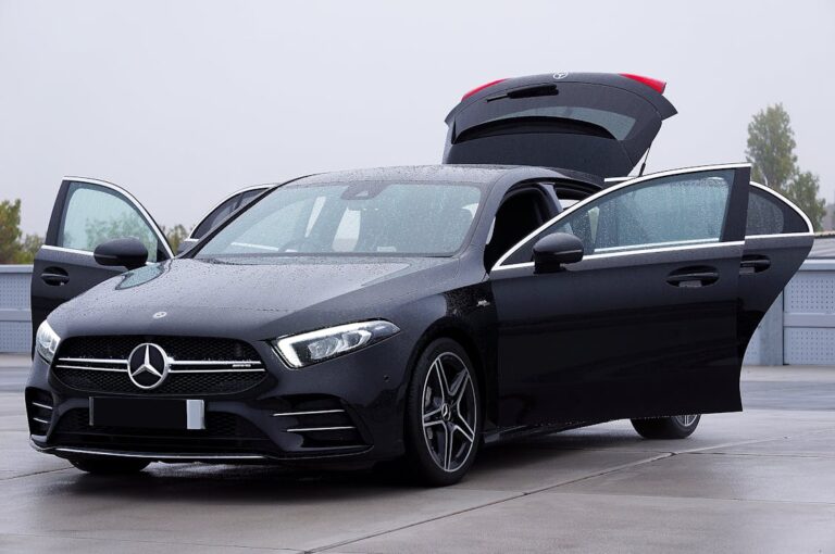 free-photo-of-sleek-black-mercedes-hatchback-with-open-doors