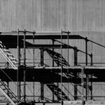 grayscale-piled-racks_422131-77